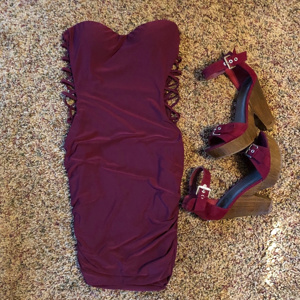 Strapless bando dress with side cut outs. Size M.